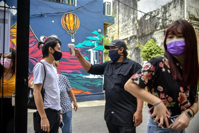 Malaysia ghi nhận số ca nhiễm mới COVID-19 cao nhất theo ngày ảnh 1