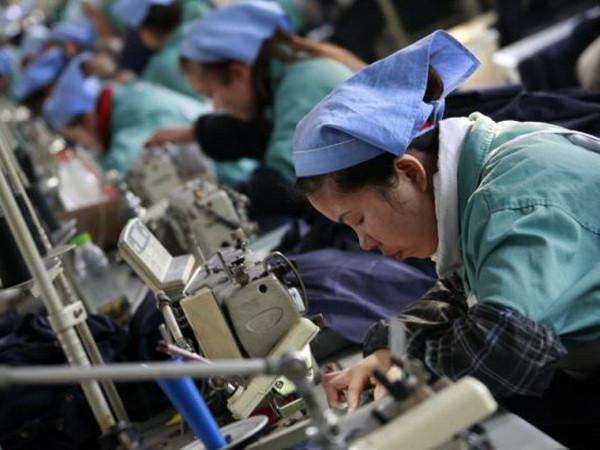 Sản lượng công nghiệp của Trung Quốc chững lại trong tháng Bảy ảnh 1