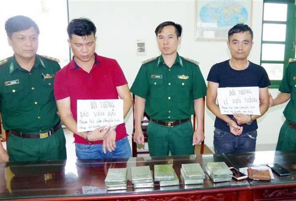 Bộ đội Biên phòng Nam Định bắt 2 đối tượng vận chuyển 10 bánh heroin ảnh 1