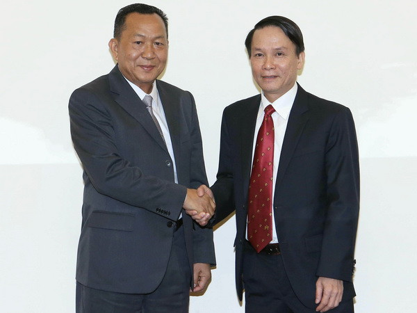 Tổng Giám đốc TTXVN hội đàm với Tổng Giám đốc TTX Pathết Lào ảnh 1