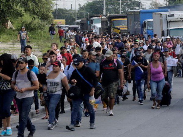 Hàng trăm người Honduras rời bỏ quê hương di cư đến Mỹ ảnh 1