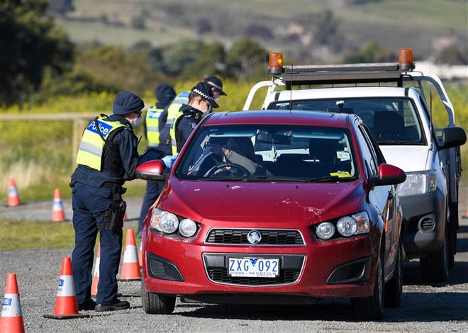 10.250 ca mắc COVID-19, Australia siết chặt các hạn chế đi lại ảnh 1