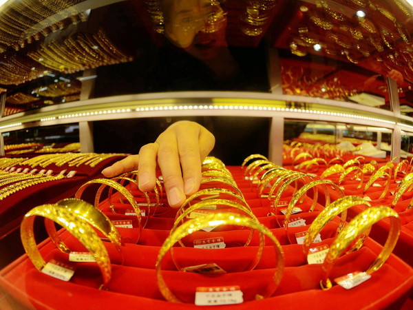 Giá vàng châu Á nhích lên sau lễ nhậm chức của ông Donald Trump ảnh 1