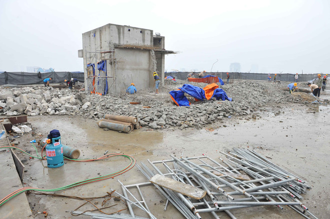 Kỷ luật cán bộ liên quan đến vi phạm tại tòa nhà 8B Lê Trực ảnh 1