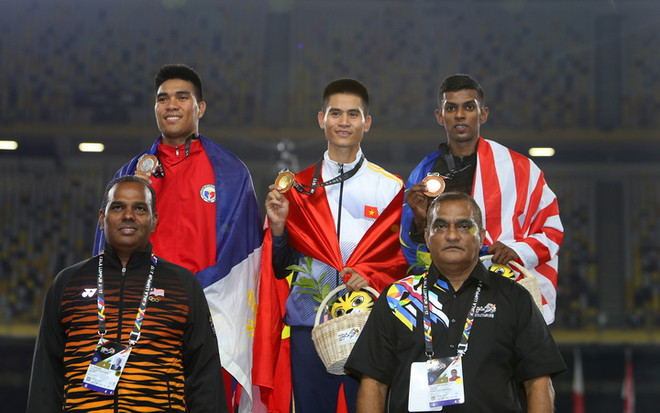 Huy chương vàng cho tinh thần đồng đội của tuyển điền kinh Việt Nam ảnh 1