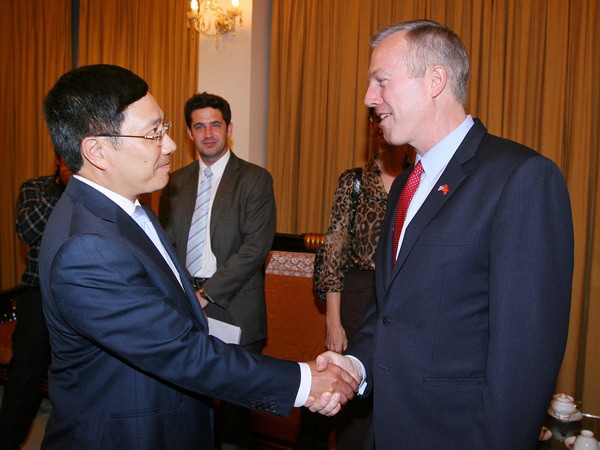 Phó Thủ tướng Phạm Bình Minh tiếp Đại sứ Hoa Kỳ Ted Osius ảnh 1