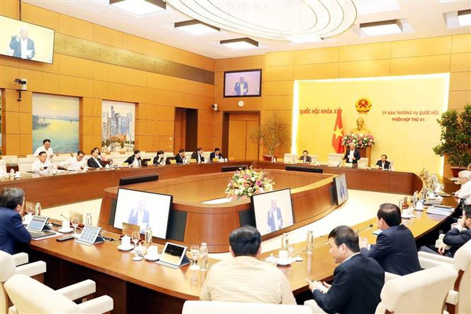Quang cảnh Phiên bế mạc. (Ảnh: Trọng Đức/TTXVN) UBTVQH thông qua sắp xếp, thành lập đơn vị hành chính 18 tỉnh ảnh 2