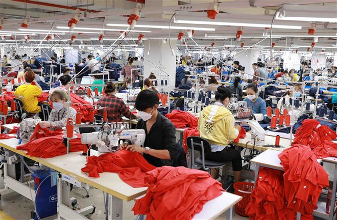 Fitch Ratings đánh giá tích cực về triển vọng tăng trưởng của Việt Nam ảnh 1