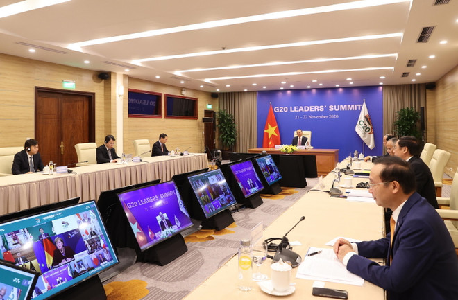 [Photo] Thủ tướng Nguyễn Xuân Phúc dự phiên thảo luận Hội nghị G20 ảnh 2