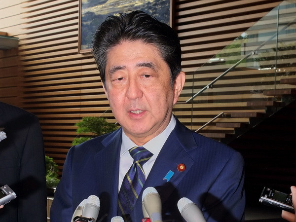 Thủ tướng Nhật Bản Abe cam kết giành lại lòng tin của người dân ảnh 1