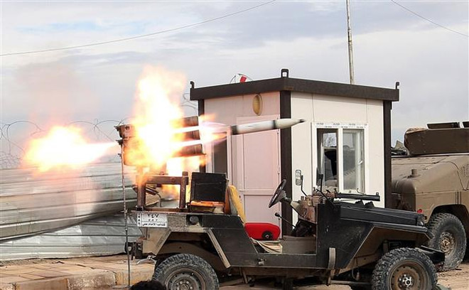 Nhóm vũ trang ở Iraq cảnh báo trả đũa các cuộc không kích của Mỹ ảnh 1