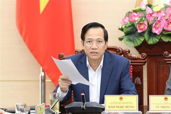 Bộ trưởng Bộ Lao động-Thương binh và Xã hội Đào Ngọc Dung phát biểu tại buổi làm việc. (Ảnh: Anh Tuấn/TTXVN) Tập trung giải quyết hồ sơ thanh niên xung phong tồn đọng ảnh 1