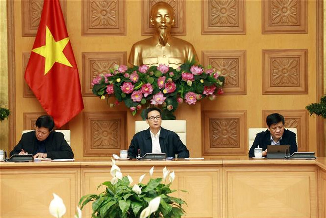 Phó Thủ tướng Chính phủ Vũ Đức Đam phát biểu. (Ảnh: Doãn Tấn/TTXVN) Tiếp tục thực hiện nghiêm cách ly đối với người nhập cảnh từ vùng dịch ảnh 1