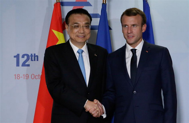 ASEM 12: Pháp và Trung Quốc tăng cường hợp tác song phương ảnh 1