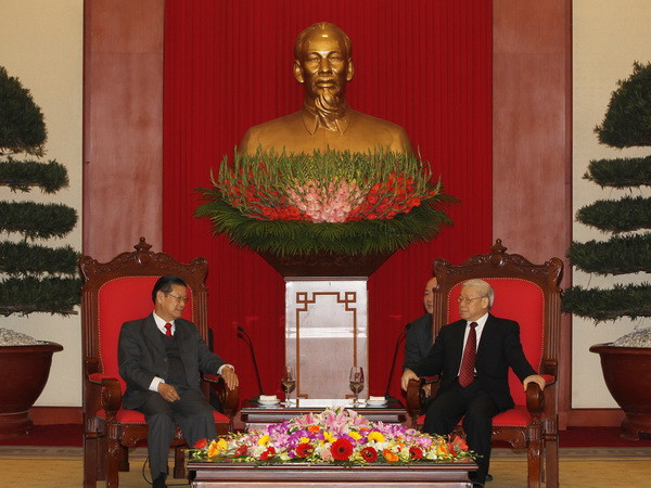 Tổng Bí thư tiếp đoàn đại biểu cấp cao Chính phủ Lào ảnh 1