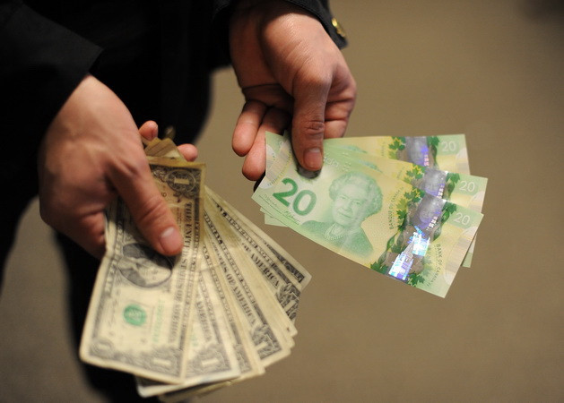 Sức phục hồi của kinh tế Canada gắn liền với kinh tế Mỹ ảnh 1