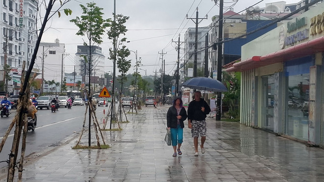 Hà Nội duy trì thời tiết ẩm, mưa nhỏ, sáng sớm có sương mù ảnh 1