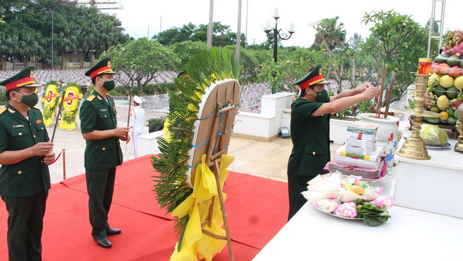 Quảng Bình: Truy điệu, an táng hài cốt liệt sỹ Việt Nam hy sinh ở Lào ảnh 1