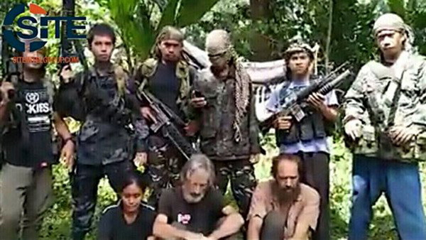 Canada, Anh cam kết không trả tiền chuộc dù hy sinh con tin ảnh 1