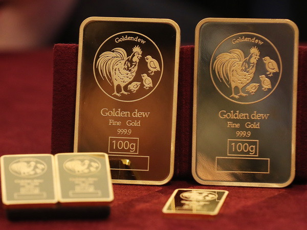Giá vàng thế giới đi xuống khi thị trường chờ thông tin từ Fed ảnh 1