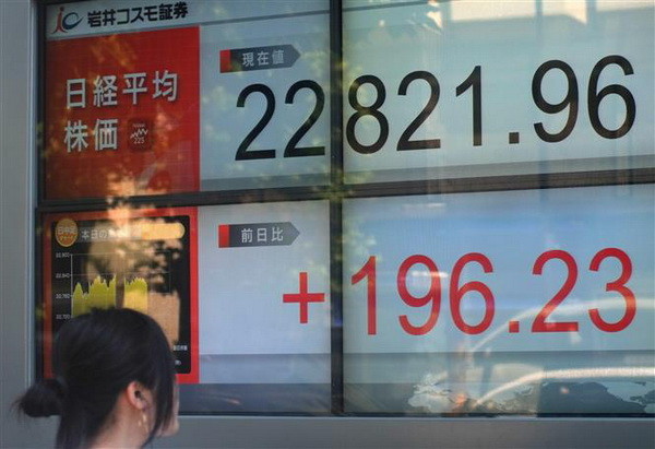 Chứng khoán Thượng Hải dẫn đầu đà tăng tại thị trường châu Á ảnh 1