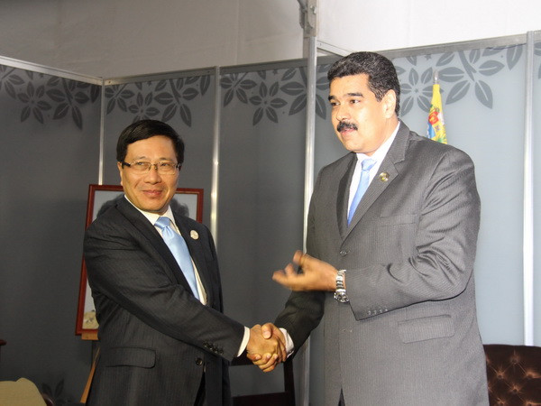 Phó Thủ tướng Phạm Bình Minh hội kiến Tổng thống Venezuela ảnh 1