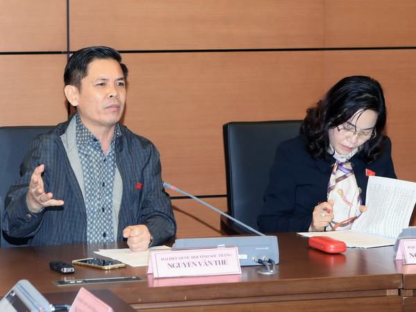 Đại biểu Quốc hội tỉnh Sóc Trăng Nguyễn Văn Thể phát biểu ý kiến. (Ảnh: Phạm Kiên/TTXVN) Hỗ trợ phát triển thị trường khoa học và công nghệ trong nước ảnh 1