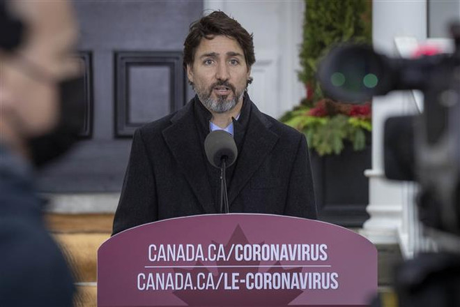 Thủ tướng Canada sẵn sàng tiêm vắcxin ngừa COVID-19 công khai ảnh 1