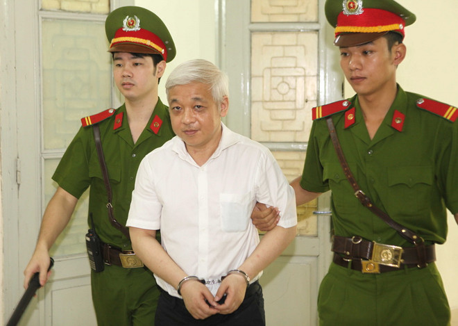 [Photo] Hội đồng xét xử tuyên phạt bầu Kiên 30 năm tù giam ảnh 1