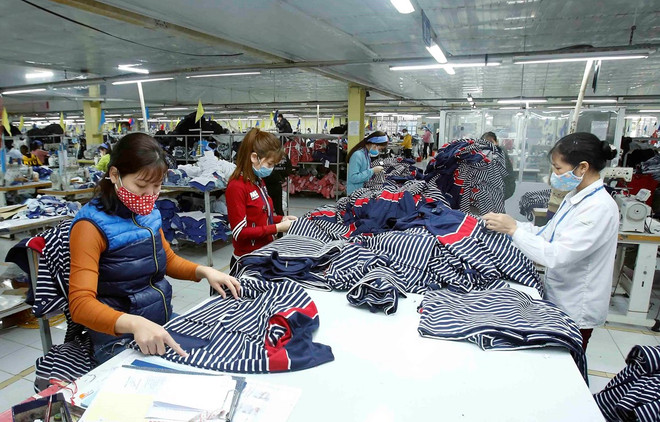 (Ảnh minh họa: Phạm Kiên/TTXVN) Kiểm soát lạm phát thích ứng từng giai đoạn của nền kinh tế ảnh 1