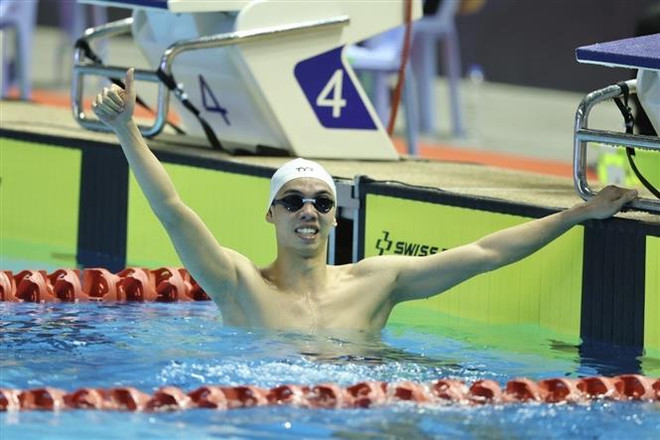 Vận động viên Nguyễn Huy Hoàng về nhất tại Chung kết Bơi 400m tự do Nam với thành tích 3 phút 49 giây 50. (Ảnh: Minh Quyết/TTXVN) Huy Hoàng bảo vệ thành công huy chương Vàng nội dung Bơi 400m tự do ảnh 1