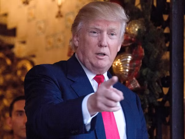 Ông Trump kêu gọi Mỹ "ngừng" điều tra cáo buộc Nga tấn công mạng ảnh 1