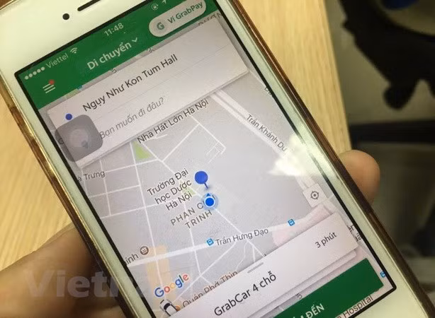 Xác định hai dấu hiệu vi phạm sau thương vụ Grab mua lại Uber ảnh 1
