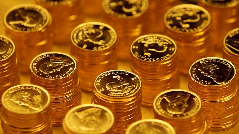 Giá vàng thế giới đi xuống, còn gần 1.856 USD một ounce ảnh 1