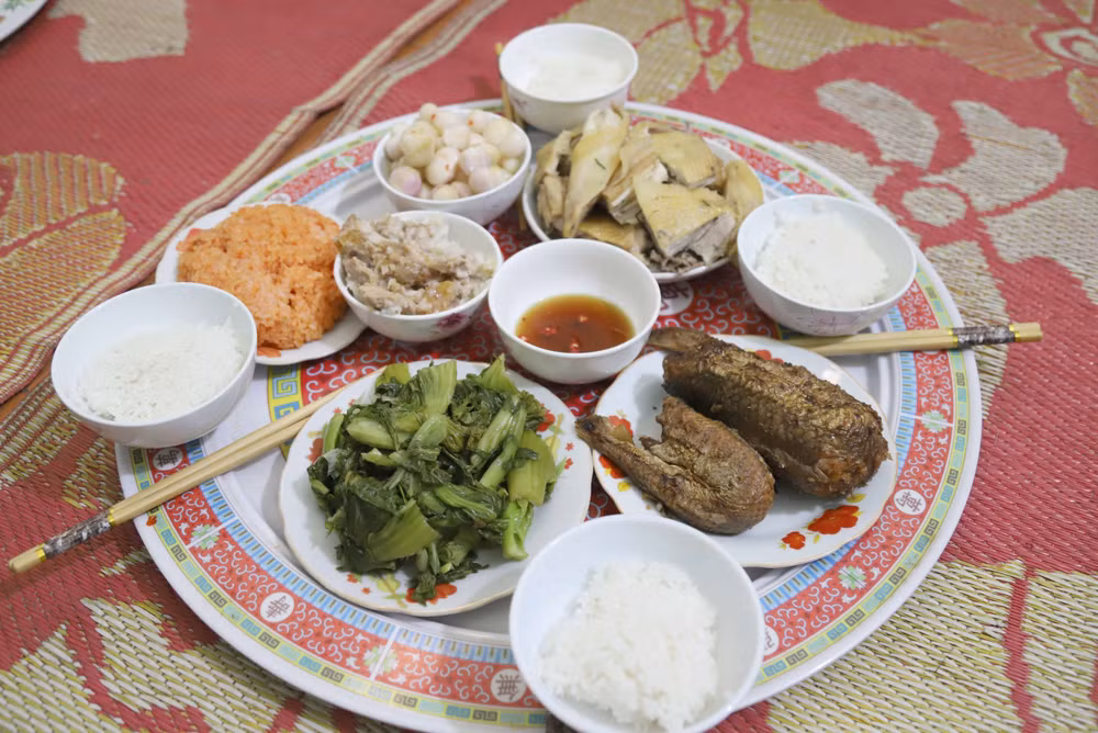 ttxvn_doc_dao_mon_ca_kho_dip_tet_cua_ngu_dan_lang_bien_dien_bich_1202-3.jpg