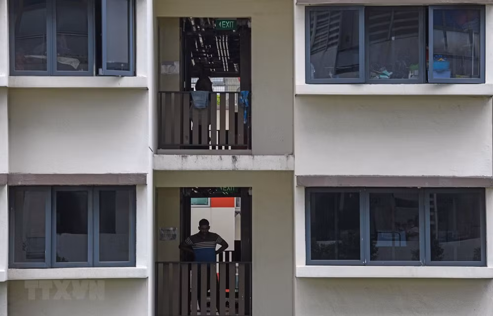 Dịch COVID-19: Singapore bắt đầu thí điểm cách ly bệnh nhân tại nhà ảnh 1