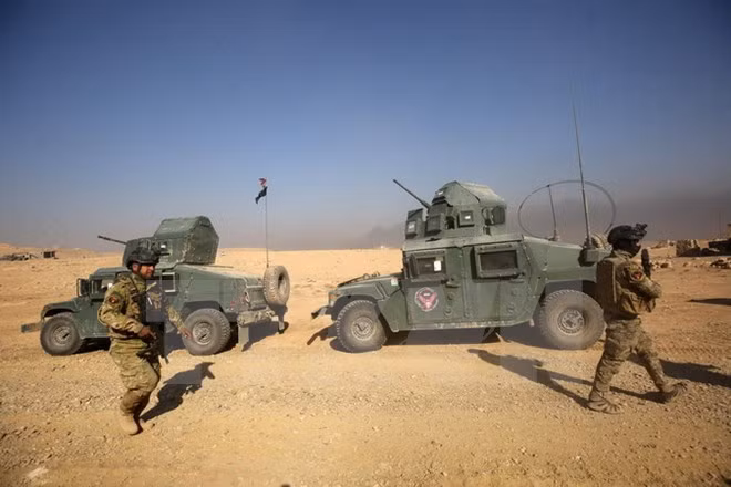 Bị dồn vào chân tường ở Mosul, IS gia tăng tấn công bom xe liều chết ảnh 1