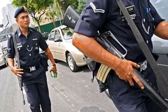 Malaysia kết án một phụ nữ vì lưu trữ hình ảnh IS trong điện thoại ảnh 1