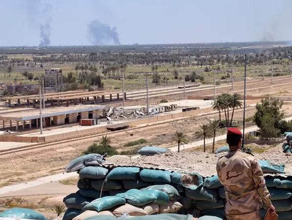 Iraq: Đánh bom xe liên tiếp làm hàng chục người thương vong ảnh 1