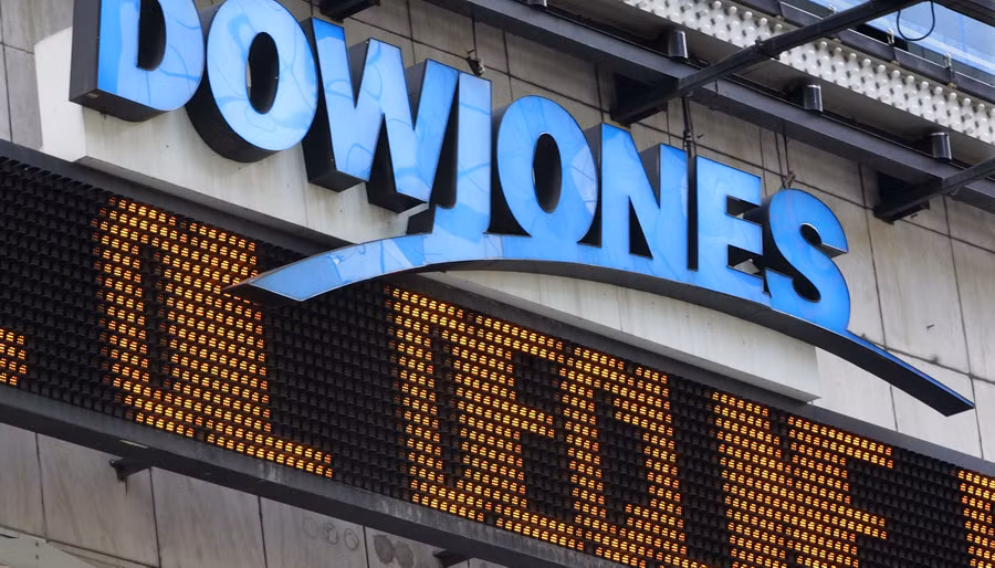 Chứng khoán Mỹ lên điểm, Dow Jones áp sát mốc 20.000 điểm ảnh 1