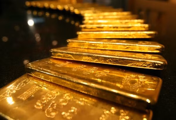 Giá vàng thế giới đi xuống dưới áp lực của đồng USD mạnh ảnh 1