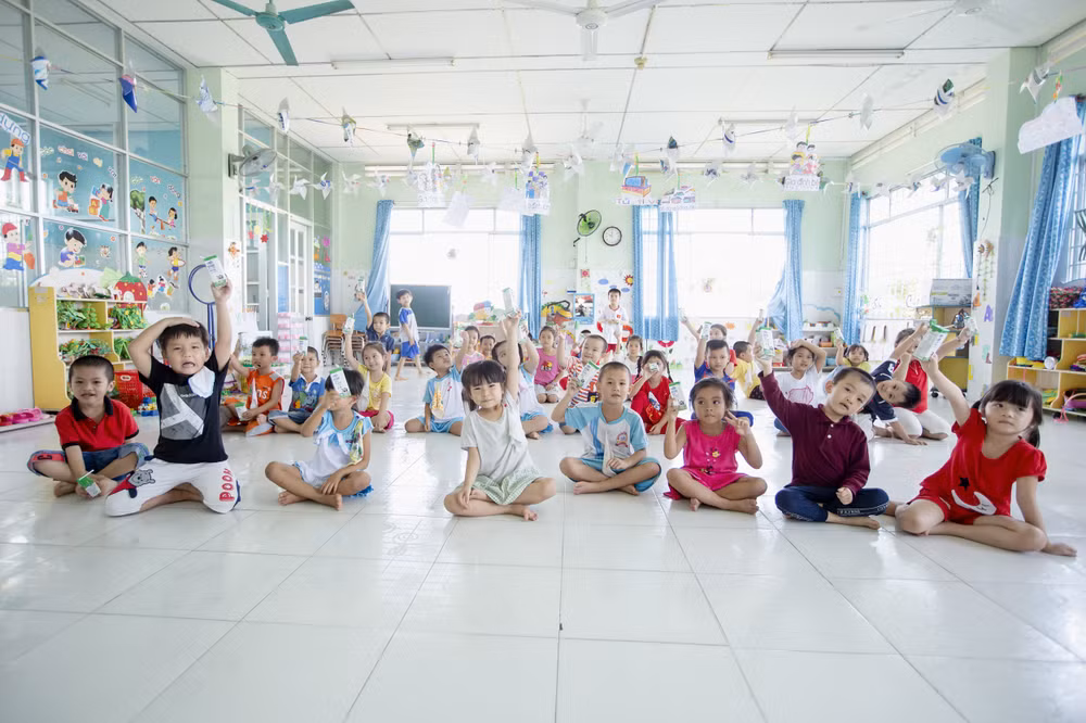 Tỉnh Vĩnh Long và Vinamilk cùng triển khai chương trình sữa học đường ảnh 3