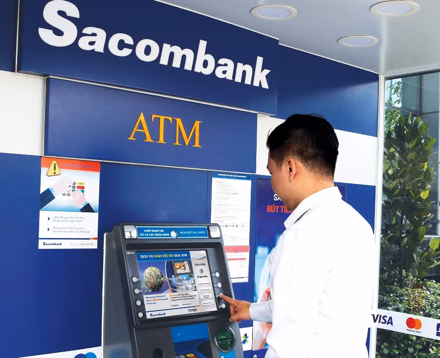 Khách hàng nhận kiều hối miễn phí tại các cây ATM của Sacombank ảnh 1