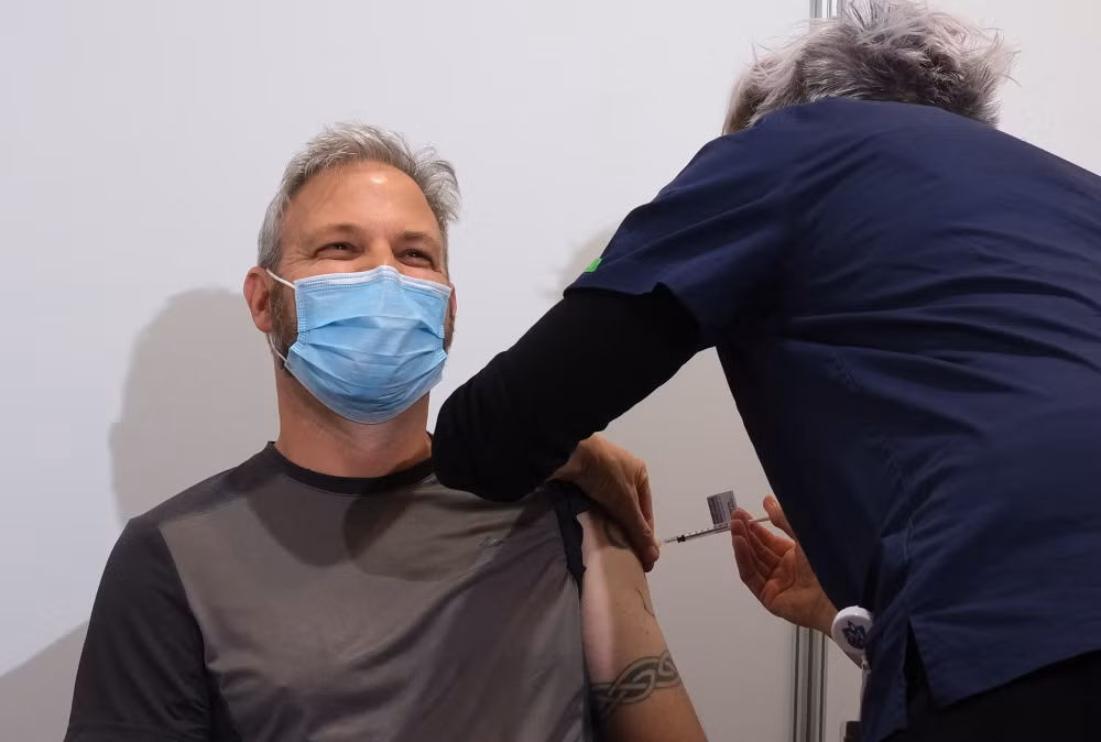 Vài bang Mỹ có thể thành "điểm nóng" dịch COVID-19 do ít tiêm vaccine ảnh 1