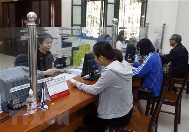 Chi trả 987 tỷ đồng chế độ ốm đau cho hơn 648.000 lao động bị COVID-19 ảnh 1