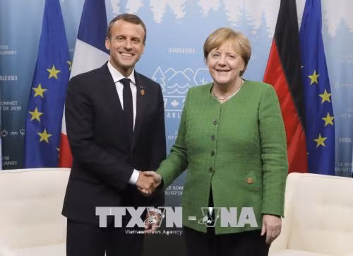 Đức và Pháp muốn tái cơ cấu nợ Eurozone một cách dễ dàng hơn ảnh 1