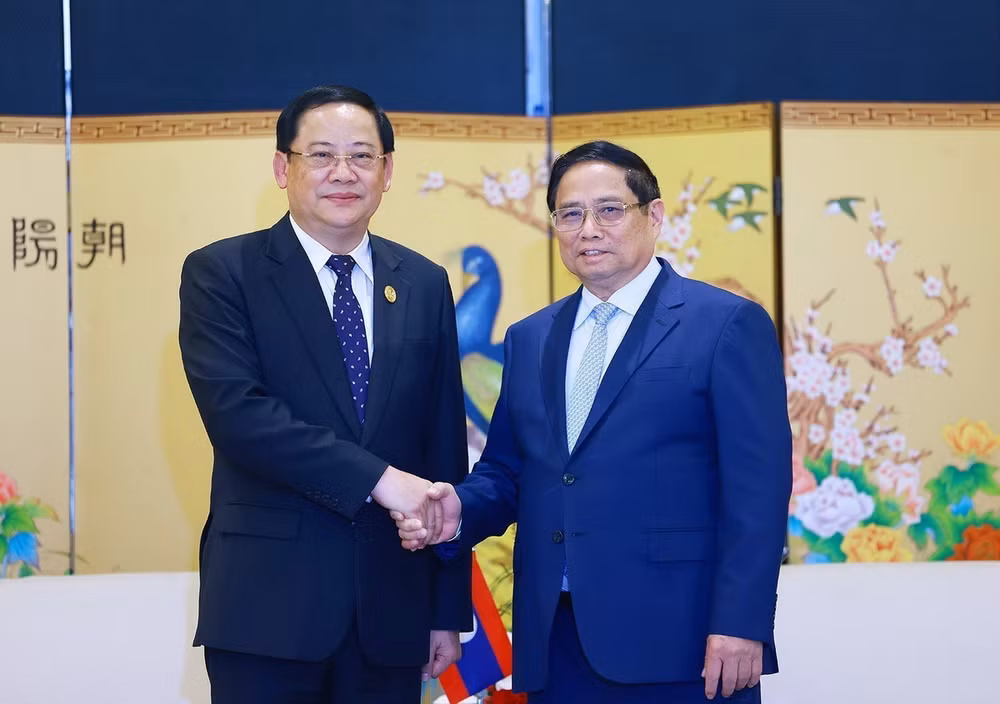 ttxvn_thu_tuong_gap_thu_tuong_lao (2).jpg