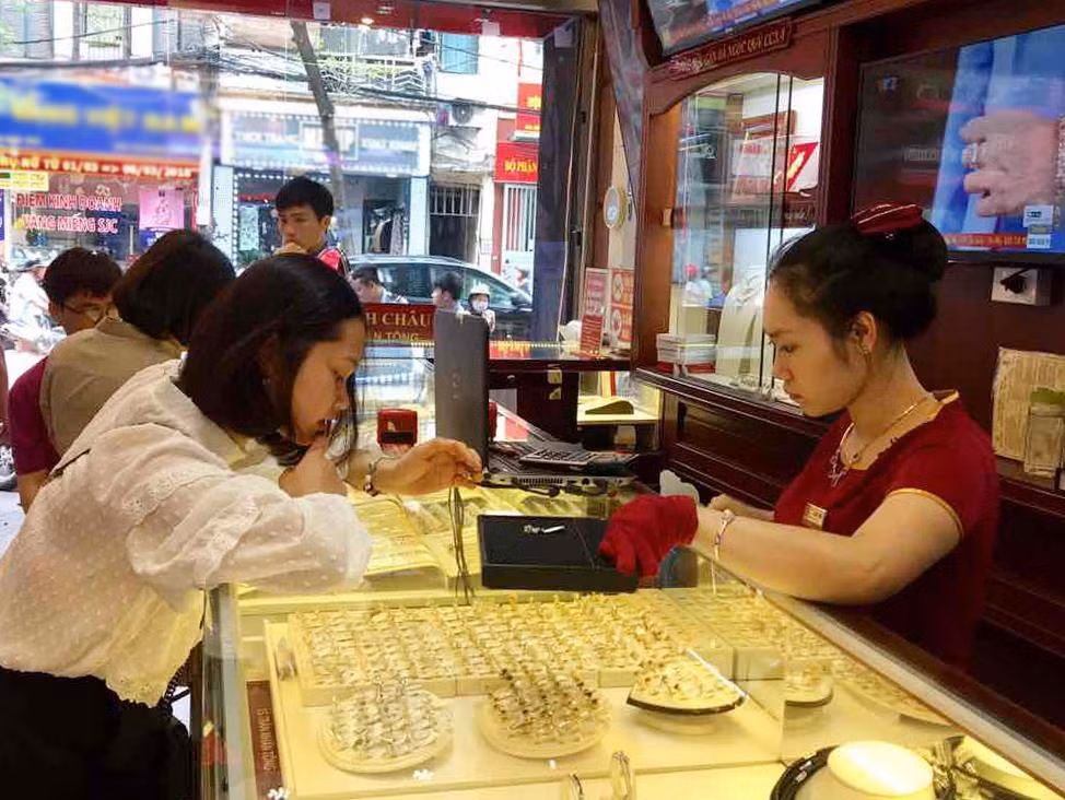 Vàng trong nước tăng nhẹ, tỷ giá trung tâm không biến động ảnh 1