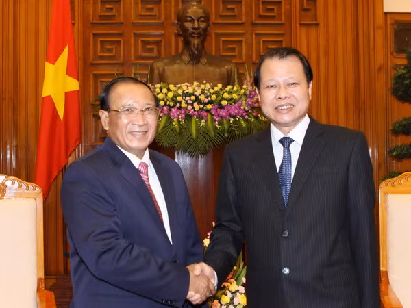 Việt Nam-Lào đẩy mạnh hợp tác trong lĩnh vực tài chính ảnh 1