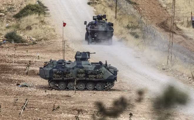 Thổ Nhĩ Kỳ cho phép người tị nạn Syria qua biên giới tới Kobane ảnh 1